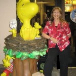 Jan and Woodstock statue in the Baggage claim area