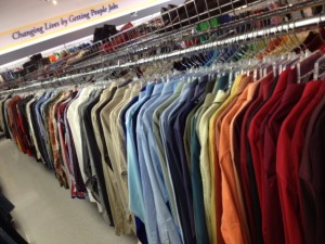 colorful shirts arranged by hue